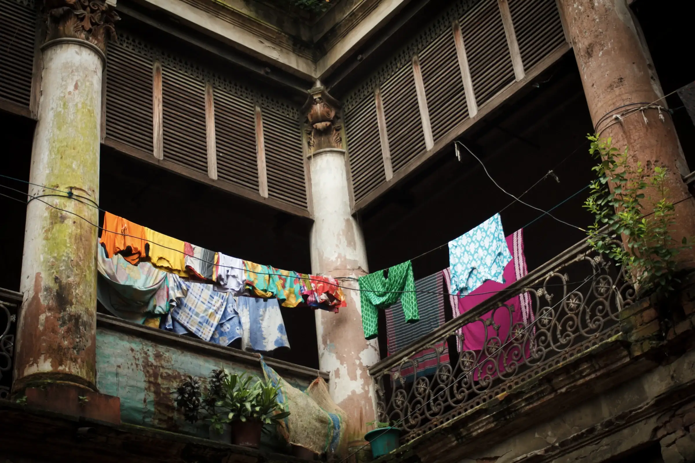 Shutters and washing in the courtyard of Ruplal House, old Dhaka, photographed in 2015.